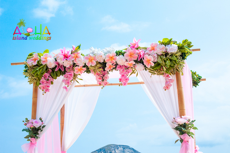 Pink tropical fantasy paradise hawaii flower arch 